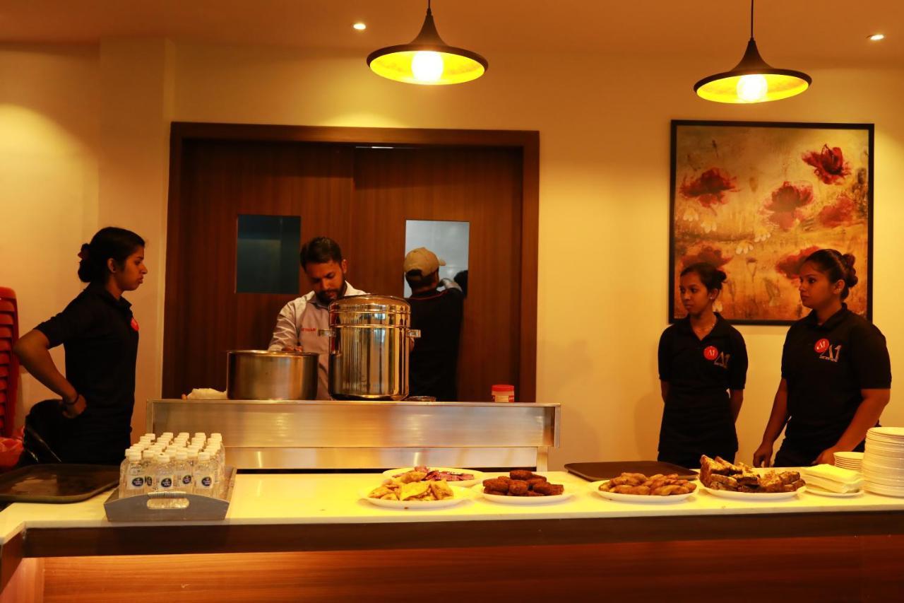 Aura One Hotel Kochi Esterno foto